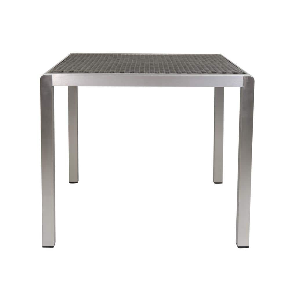 Outdoor aluminum dining table with wicker top, suitable for backyard garden