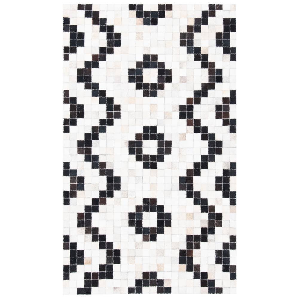 Handmade Black and White Geometric Cowhide Rug
