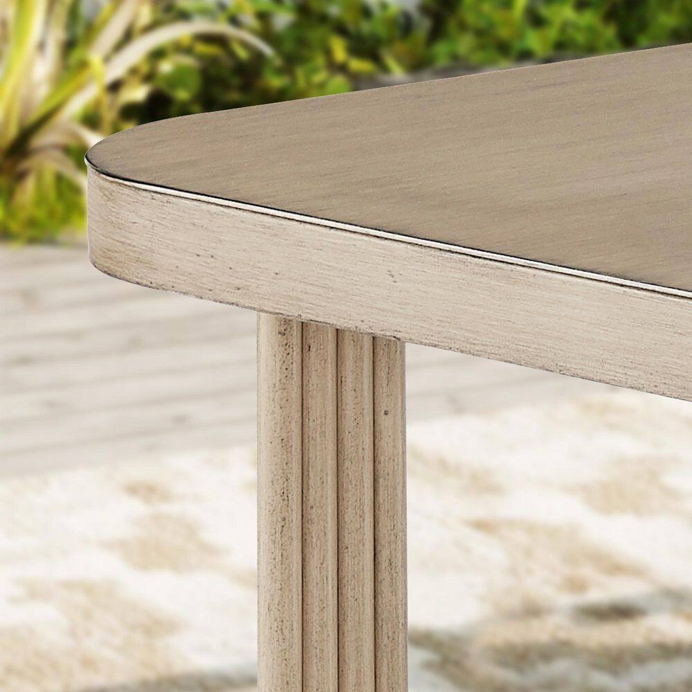Close-up of the rectangular coffee table top and leg.
