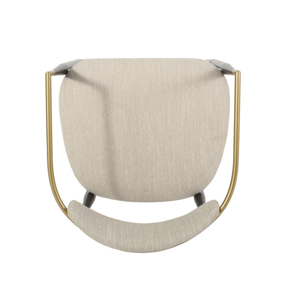 Top-down view of the beige fabric seat and gold frame of a bar stool.
