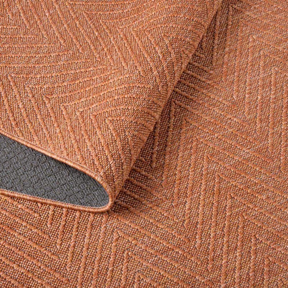 Pax Rust Herringbone Round Washable Area Rug