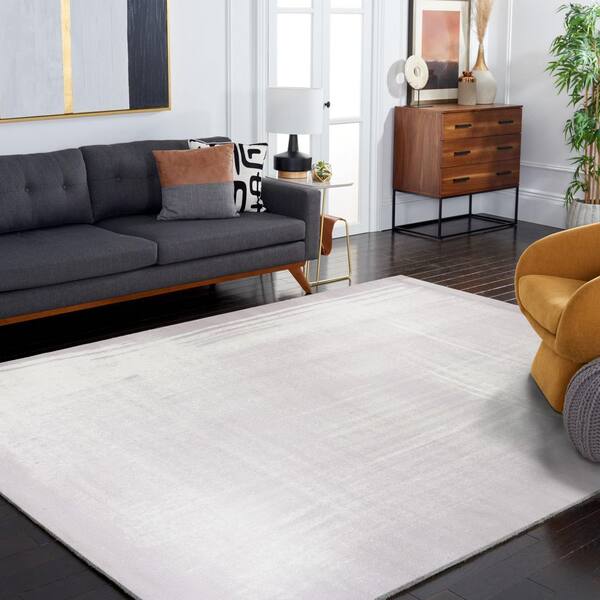 SAFAVIEH Skyler 5 ft. x 8 ft. Gray/Ivory Distressed Overdyed Area