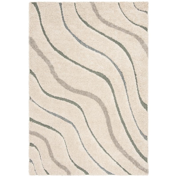 SAFAVIEH Florida Shag Cream/Light Blue 6 ft. x 9 ft. Solid Area Rug