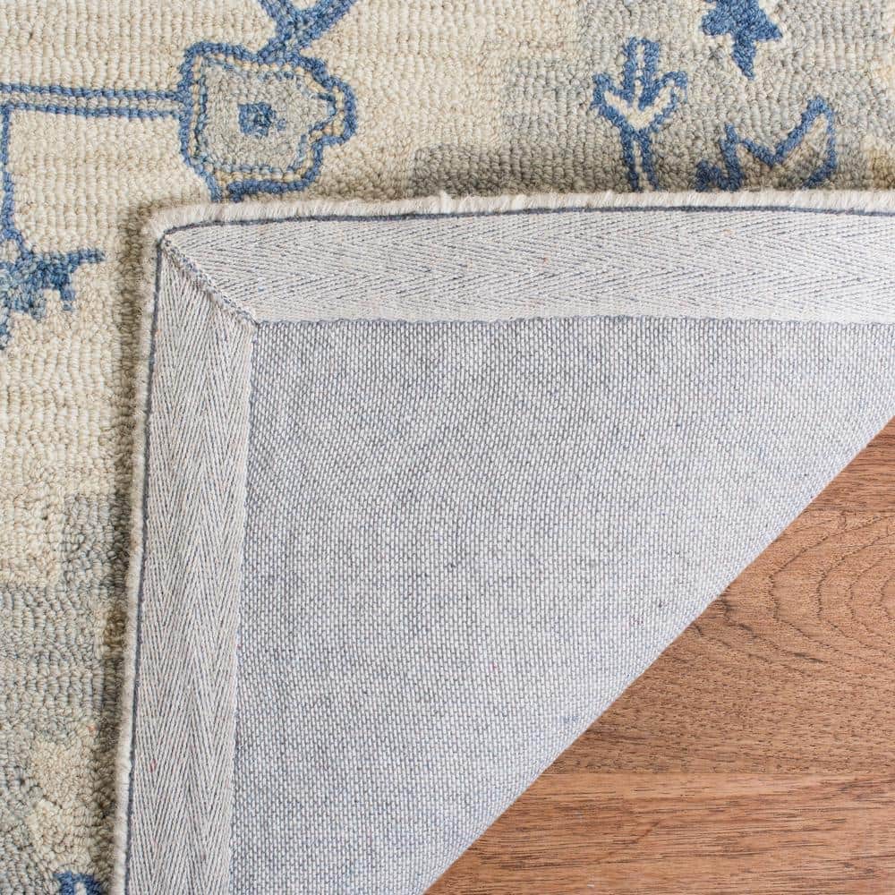 Ivory and Blue Handmade Wool Round Tufted Rug