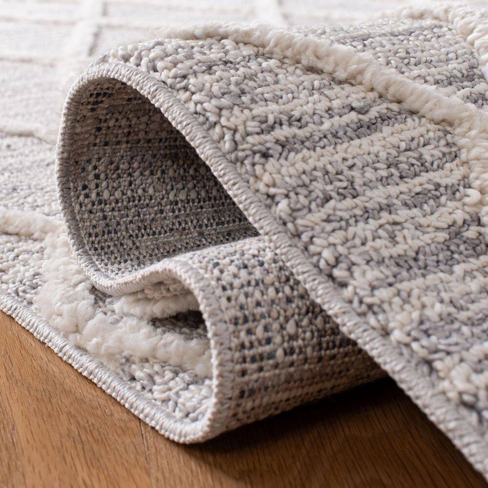 Beige 10' Square Geometric Synthetic Area Rug