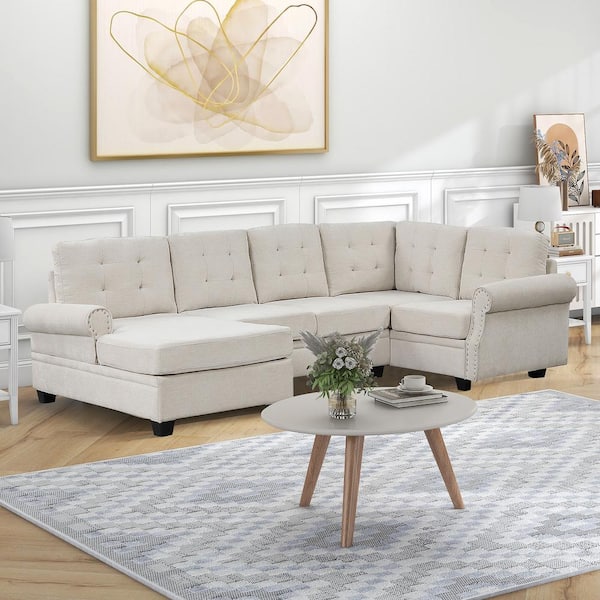 Beige sofa deals with nailhead trim