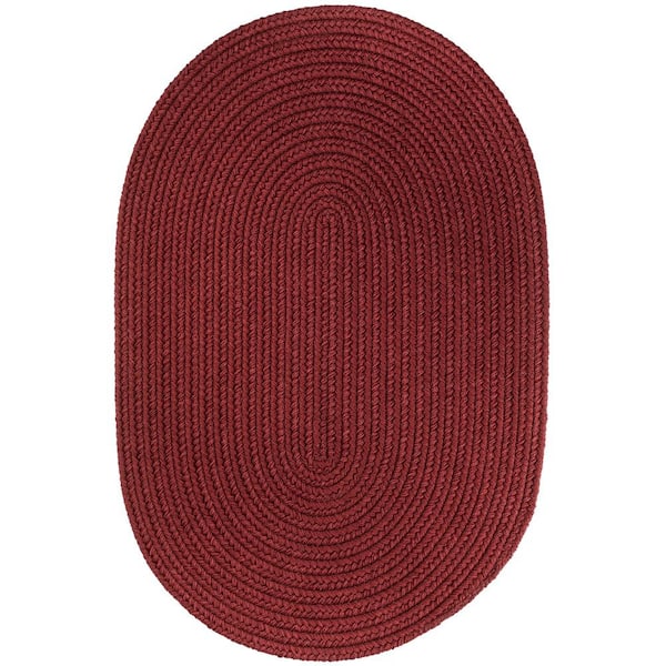 Unbranded Texturized Solid Colonial Red Poly 7 ft. x 9 ft. Oval Braided Area Rug