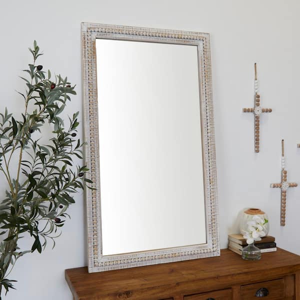 Litton Lane 48 in. x 28 in. Carved Beaded Rectangle Framed White Wall Mirror