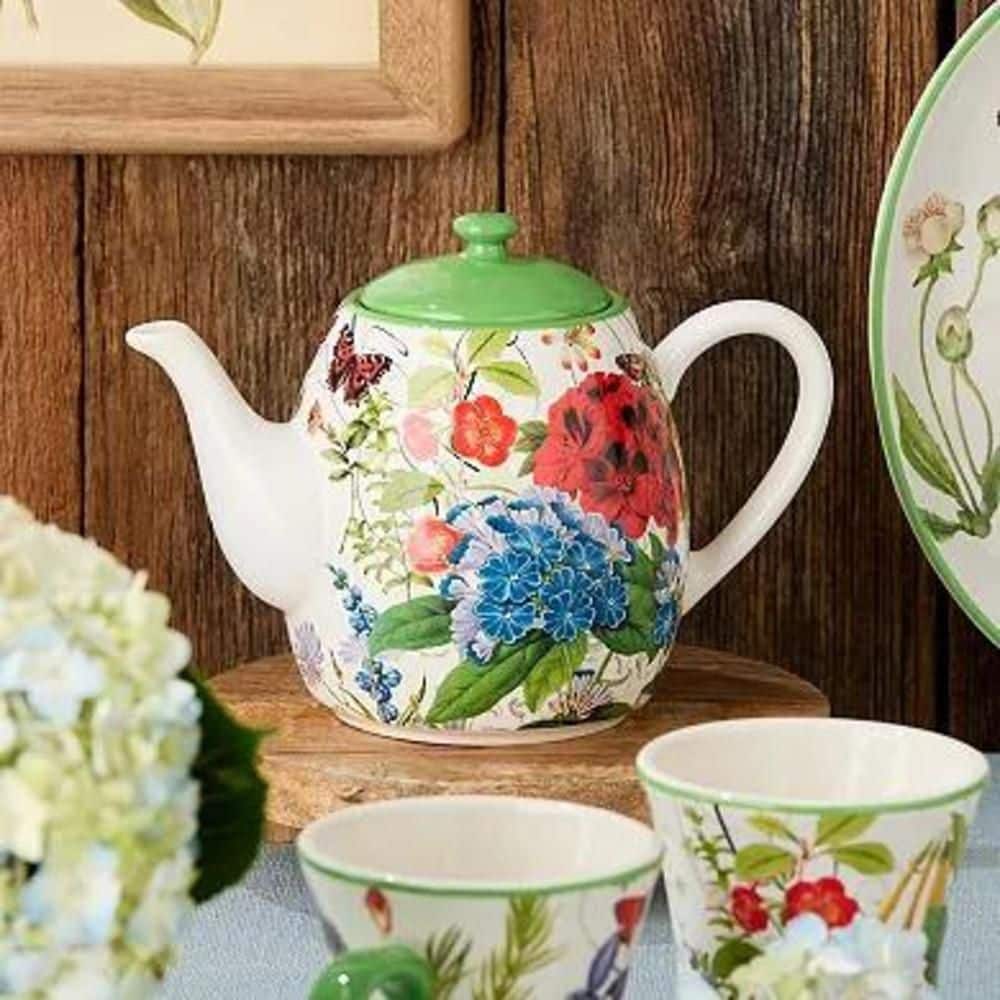Green and White Ceramic Floral Teapot with Butterfly Accents