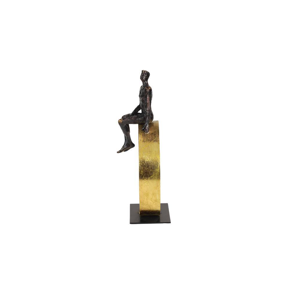Black and Gold Resin Human Figurine on Circular Base