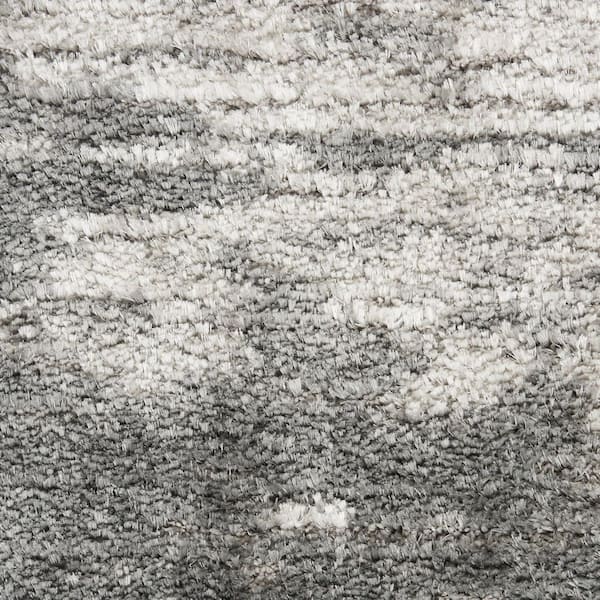 5' X 7' Charcoal and Ivory Abstract Shag Area Rug