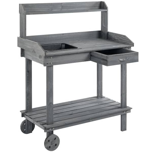 Zeus & Ruta 36.25 in. W x 46.75 in. H Wood Garden Potting Bench Table with Removable Wheels, Drawer for Backyard, Gray