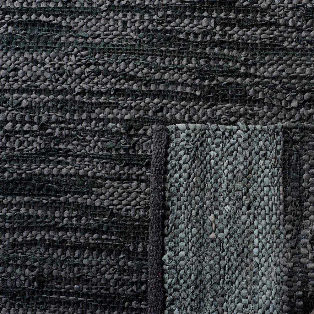 Mod-Chic Black and Grey Handmade Cowhide & Synthetic Flatweave Rug, 2' x 3'