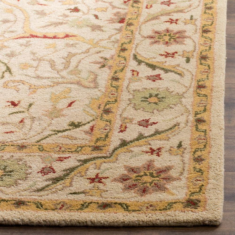 Elegant Ivory Wool 3' x 5' Hand-Tufted Rectangular Area Rug