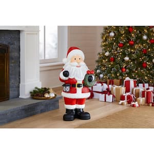 36 in. Christmas Santa Holding Solar Lantern & Wreath