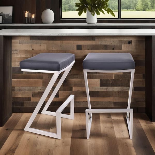 Armen Living Atlantis 26 in. Backless Bar Stool in Brushed Stainless Steel with Black Pu upholstery