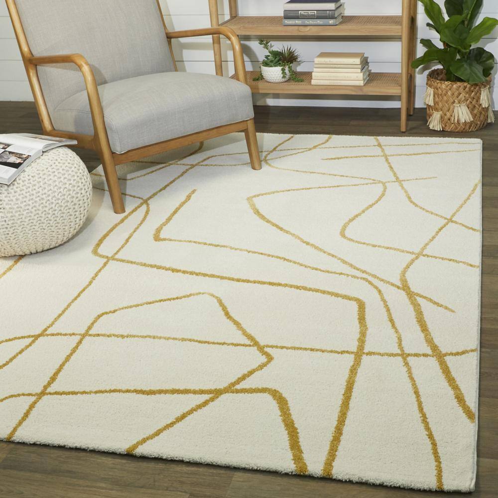 Mustard and Ivory Abstract Rectangular Synthetic Area Rug 6'7" x 9'