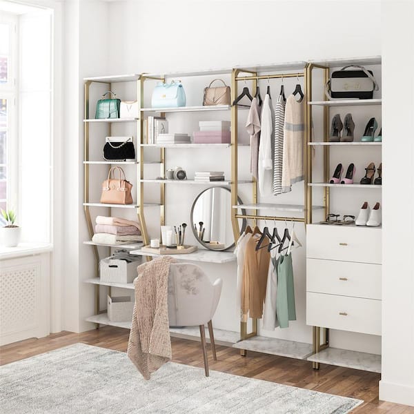 https://images.thdstatic.com/productImages/3754804a-d73d-4fd7-a803-13258bdca04f/svn/white-marble-cosmoliving-by-cosmopolitan-wood-closet-systems-5205891com-31_600.jpg