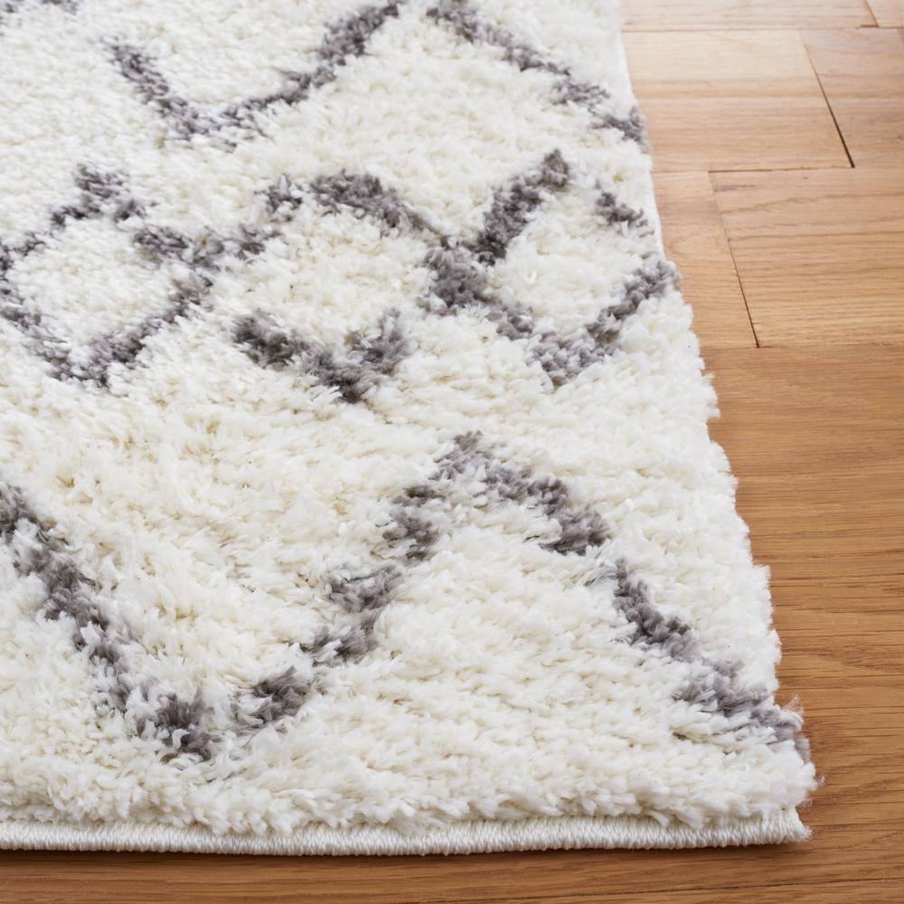 Cream and Light Grey 8' x 10' Shag Synthetic Area Rug