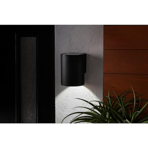 7.8 in. 1-Light Modern Black LED Solar Cylinder Outdoor Wall Light Sconce with Dark Sky Compliance