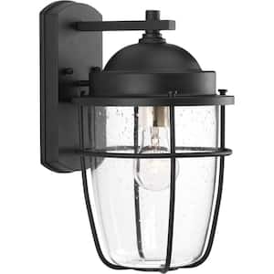 Holcombe Collection 1-Light Textured Black Clear Seeded Glass Farmhouse Outdoor Medium Wall Lantern Light