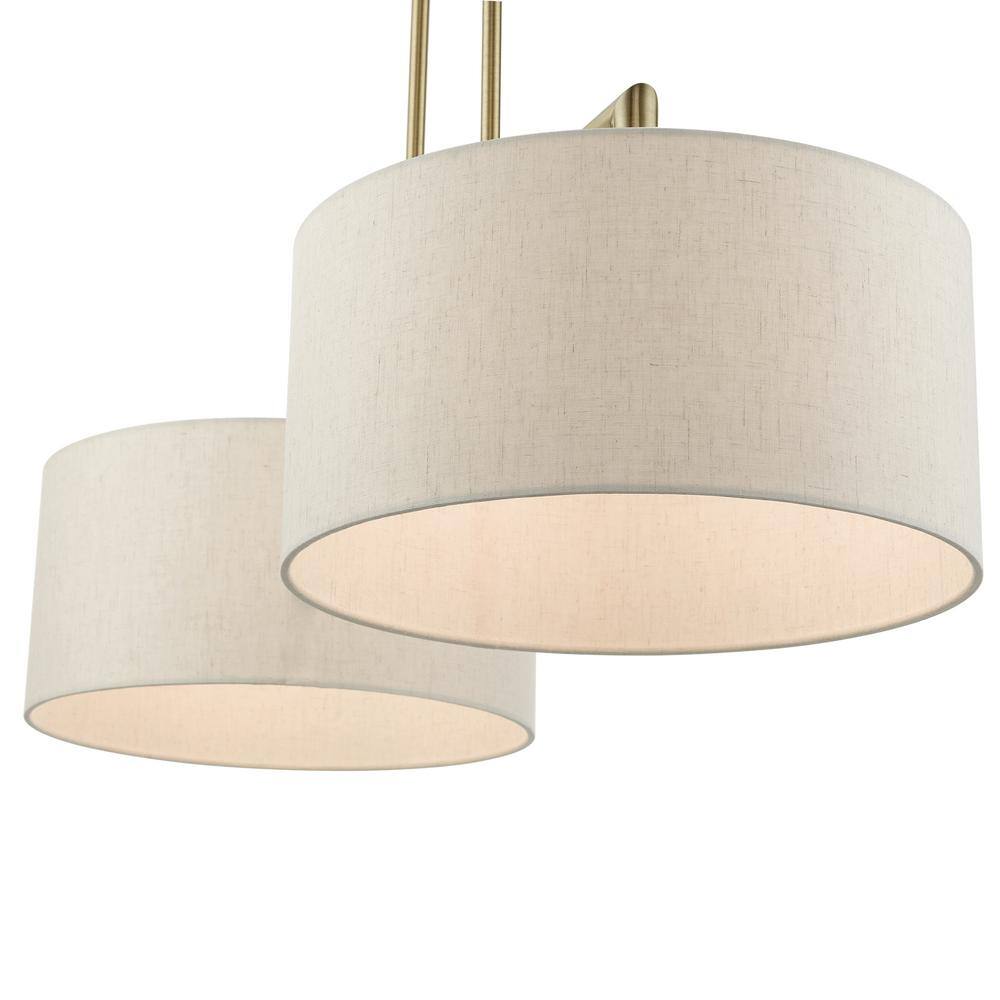 Antique Brass Dual-Light Linear Chandelier with Oatmeal Shades