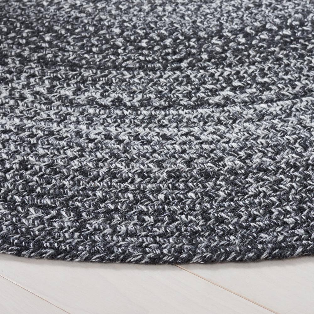 Handmade Black and Ivory Braided Round Synthetic Rug, 4' Diameter