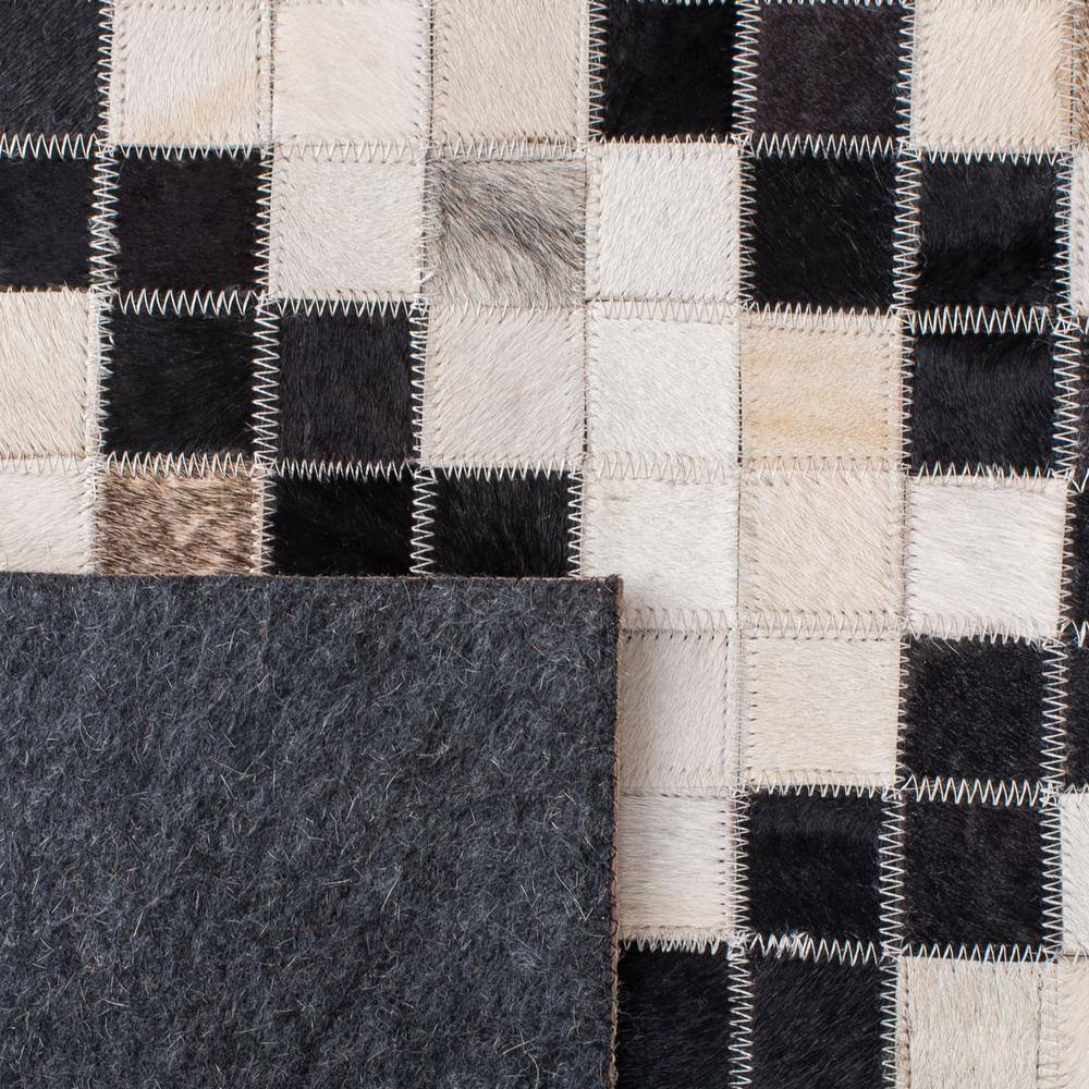 Handmade Black and White Geometric Cowhide Rug