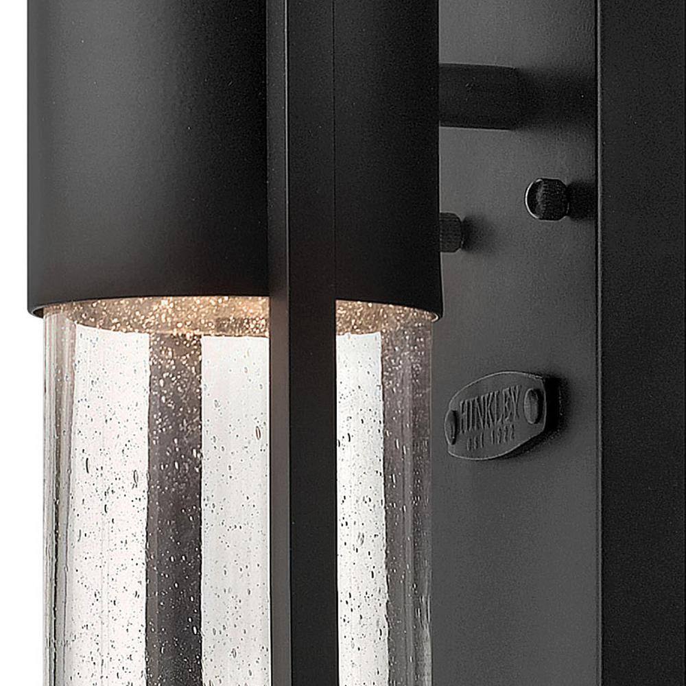 Sleek Black Outdoor Wall Sconce with Clear Seedy Glass