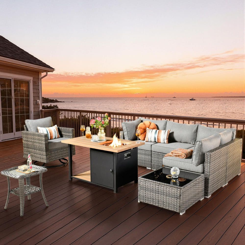Sanibel Gray 8-Piece Wicker Patio Conversation Sofa Set with a Swivel Chair, a Storage Fire Pit and Dark Gray Cushions