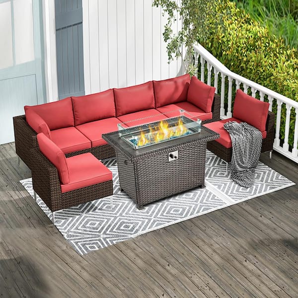 Cesicia 7-Piece Wicker Patio Conversation Set with 44 in. Black 50,000 BTU Fire Pit Table w/Wind Guard in Red Cushions