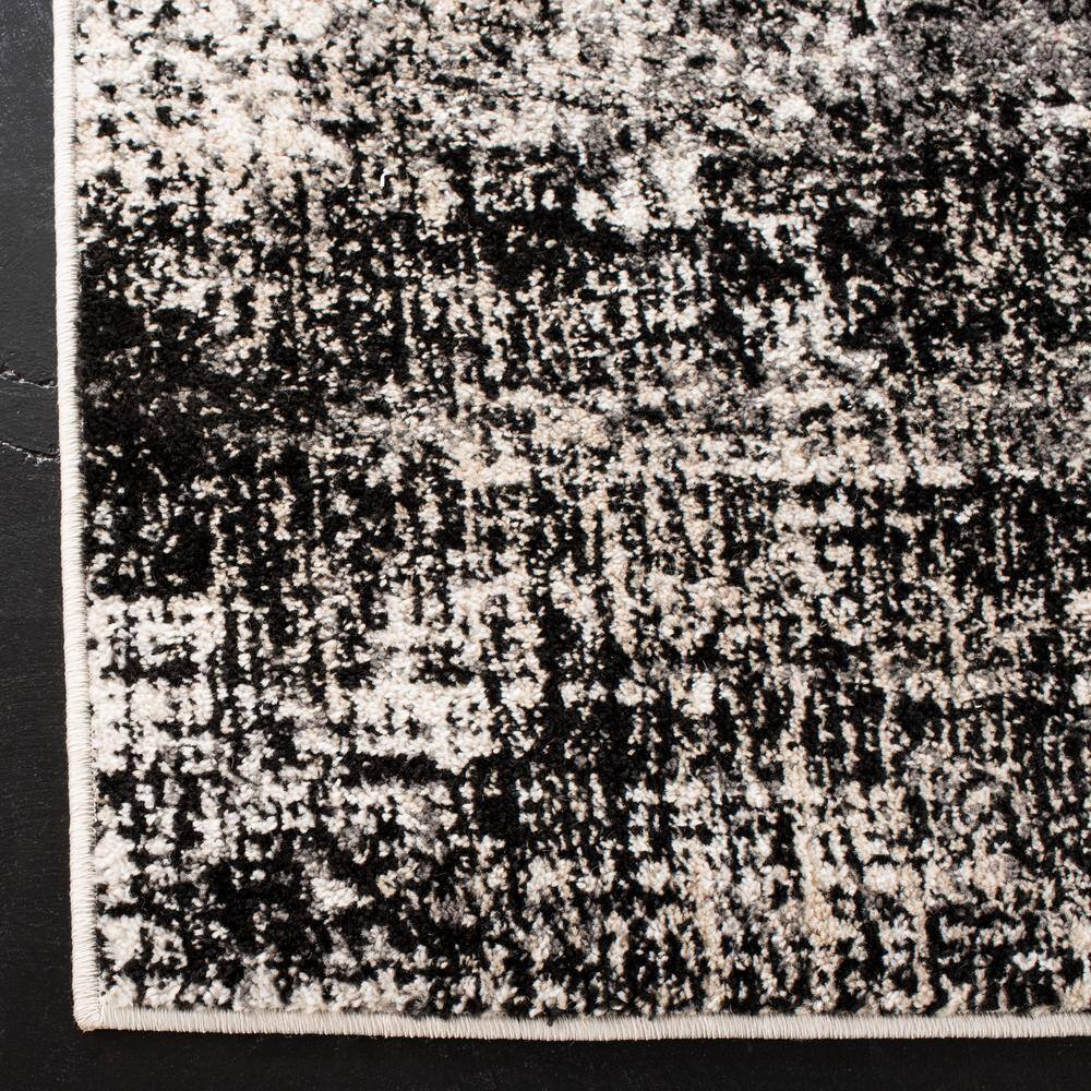 Silver/Black 9' x 12' Abstract Synthetic Rectangular Area Rug