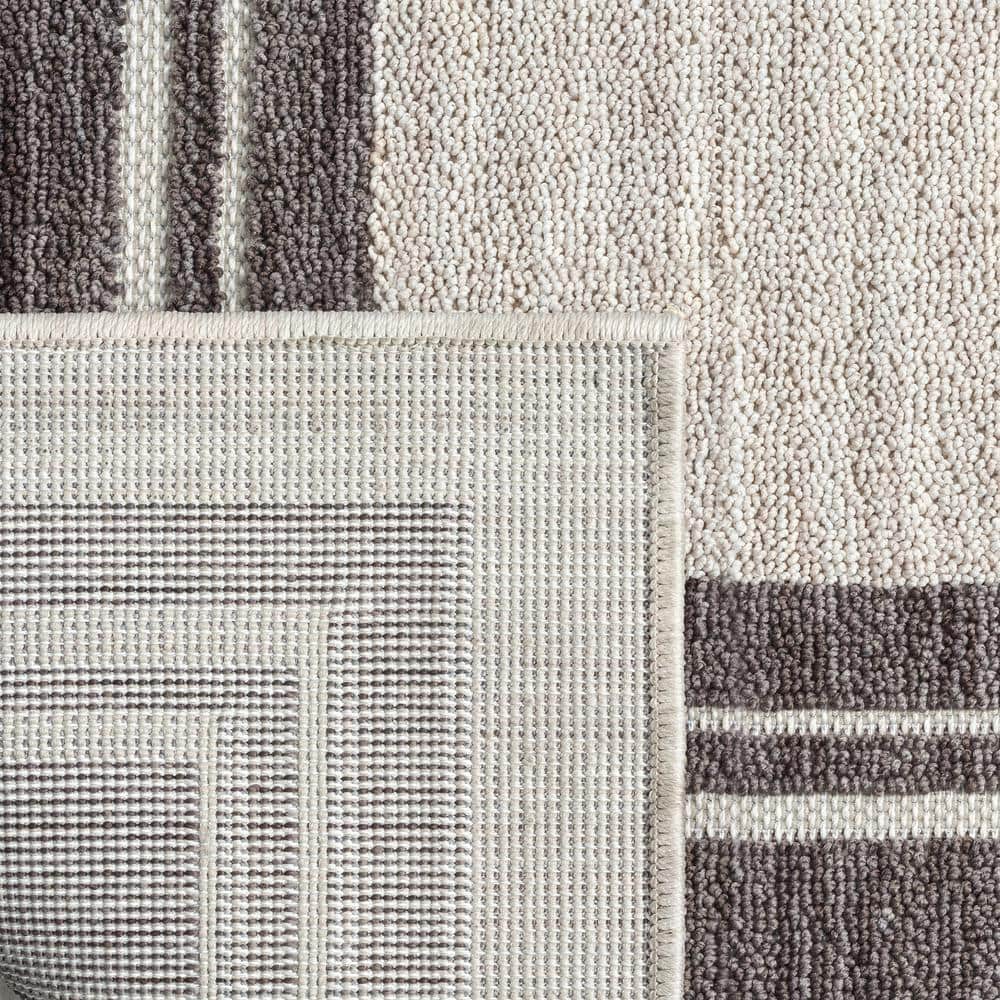 Winona 5' x 7' Ivory Rectangular Synthetic Area Rug