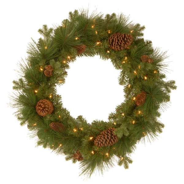 National Tree Company 24 in. Eastwood Spruce Artificial Wreath with Battery Operated Warm White LED Lights
