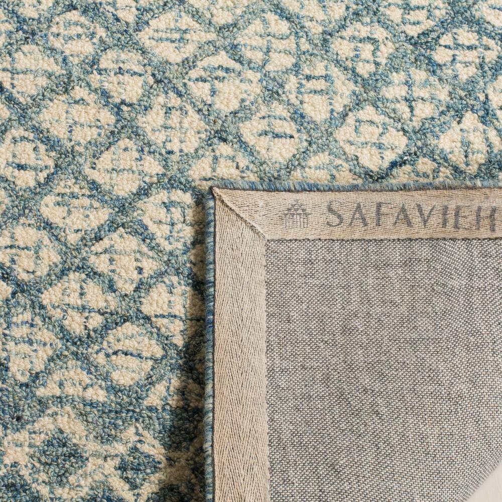 Handmade Ivory Wool Abstract Tufted Rectangular Rug 27" x 5"