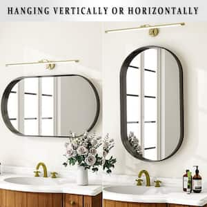 20 in. W x 36 in. H Oval Black Metal Deep Framed Wall Bathroom Vanity Mirror