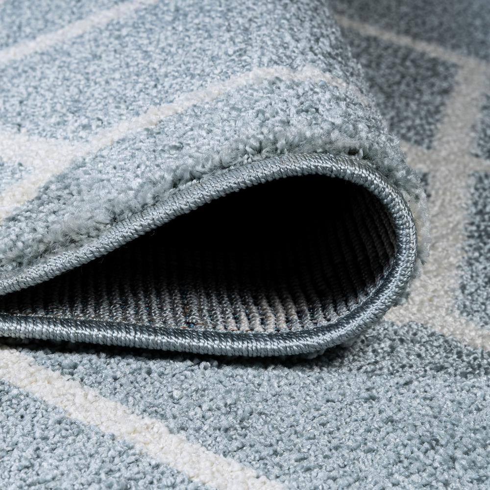 Light Blue and White Geometric 4' x 6' Area Rug