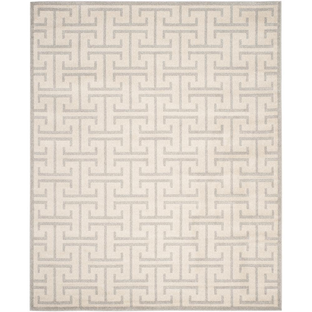 Ivory and Light Gray Rectangular 9' x 12' Synthetic Rug