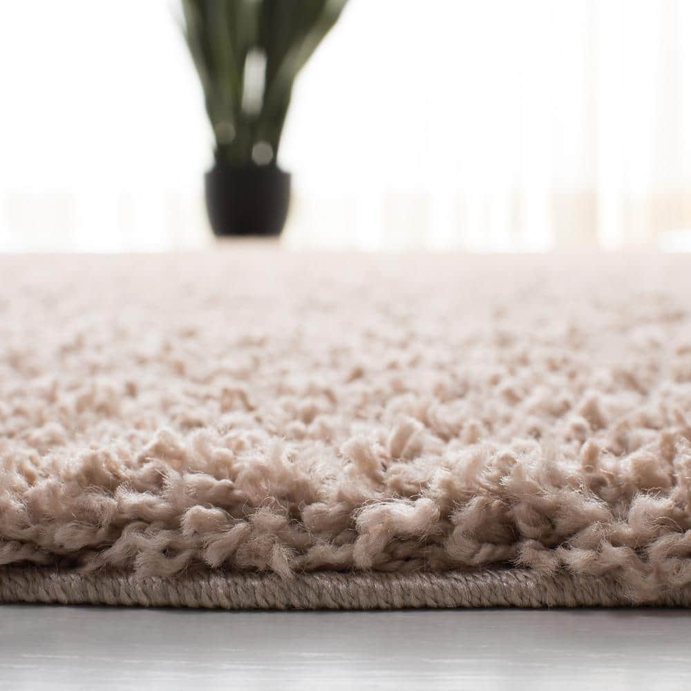 Beige 5'3" x 7'6" Synthetic Shag Area Rug