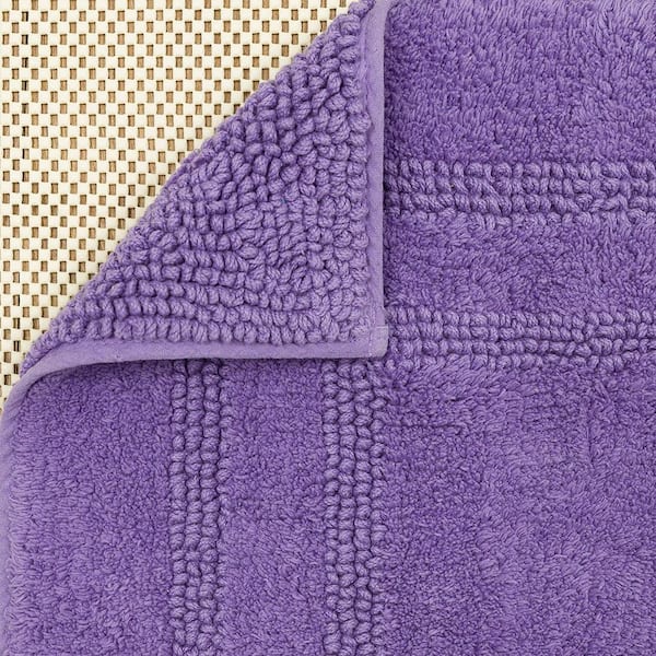 https://images.thdstatic.com/productImages/38366219-35cb-4799-b6ed-881ec684014c/svn/fiesta-grape-mohawk-home-bathroom-rugs-bath-mats-102303-4f_600.jpg