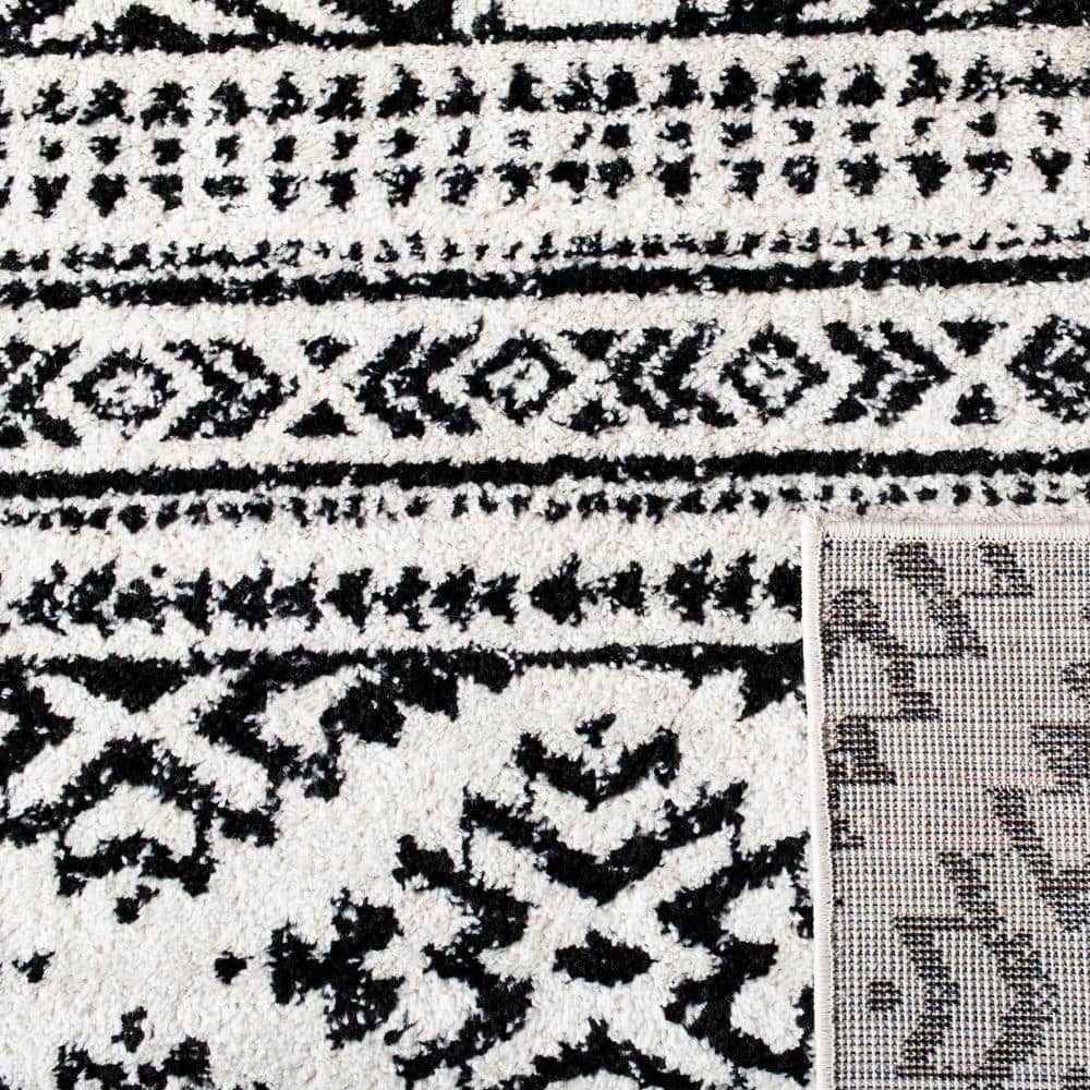 Ivory and Black Geometric 4' x 6' Hand-knotted Area Rug