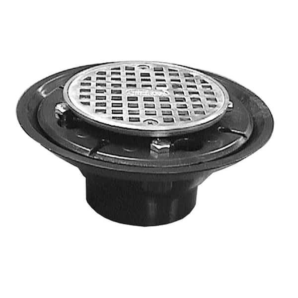 JONES STEPHENS 2 in. x 3 in. ABS Shower/Floor Drain with Brass Tailpiece and 4 in. Round Stainless Steel Strainer