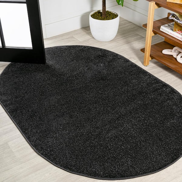 Haze Solid Low-Pile Black 6 ft. x 9 ft. Oval Area Rug