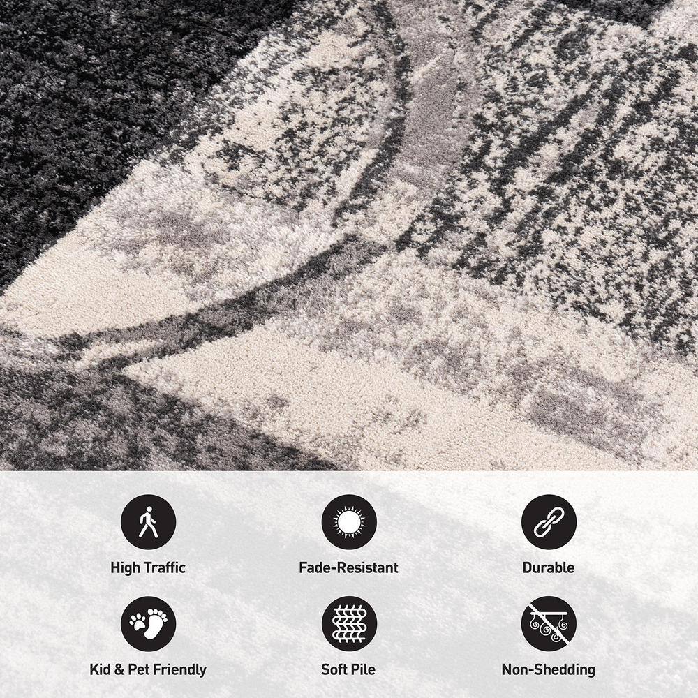 Cream and Gray Abstract Synthetic Area Rug 3'3" x 5'