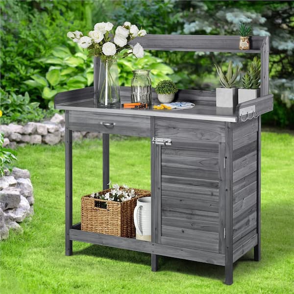 https://images.thdstatic.com/productImages/38675100-44a0-4b55-87ba-890770331a33/svn/gray-yaheetech-potting-benches-and-tables-dyvheo0001-c3_600.jpg