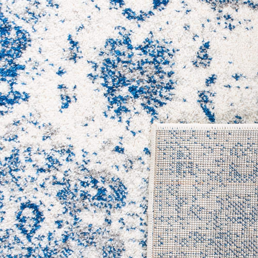 Madison Blue and White Distressed Synthetic Area Rug