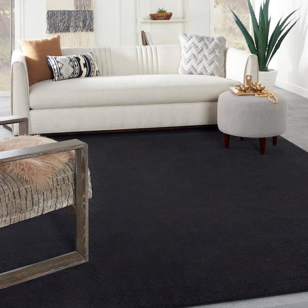 Essentials 6 ft. x 9 ft. Black Solid Contemporary Indoor/Outdoor Patio Area Rug