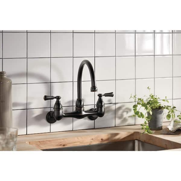 https://images.thdstatic.com/productImages/38b086e1-d2cd-43c6-a7c6-5b4a632d04d7/svn/oil-rubbed-bronze-peerless-standard-kitchen-faucets-p2765lf-ob-31_600.jpg