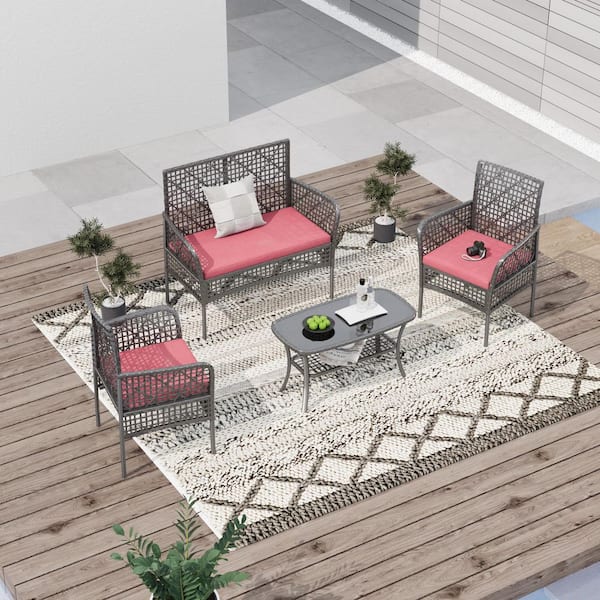 Zeus & Ruta 4-Piece Wicker Patio Conversation Set with Red Cushions and Coffee Table for Backyard