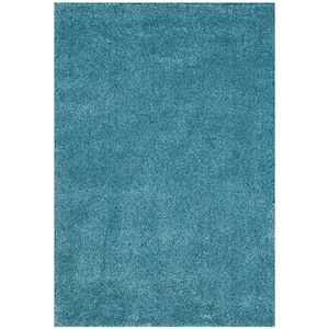 California Shag Turquoise 5 ft. x 8 ft. Solid Area Rug